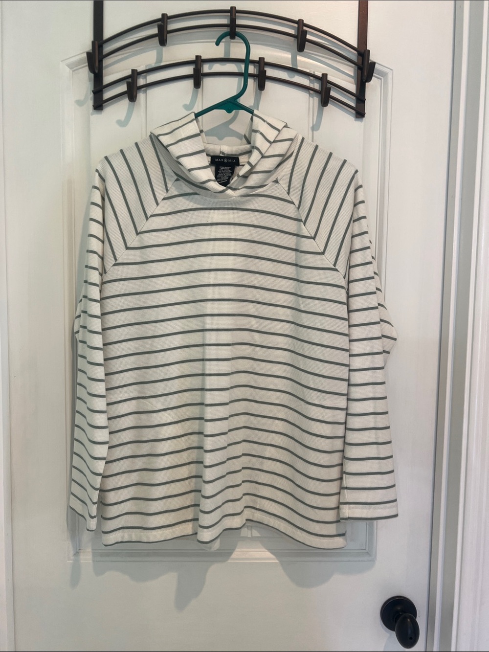Max and Mia cream hoodie with green stripes.